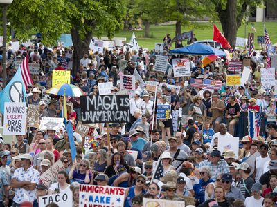 Kansans protest President Donald Trump at the June 14, 2025, "No Kings" rally at the Statehouse in Topeka.