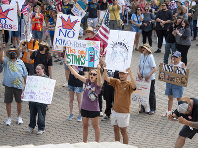 Kansans protest President Donald Trump at the June 14, 2025, "No Kings" rally at the Statehouse in Topeka.