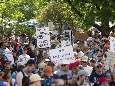 Kansans protest President Donald Trump at the June 14, 2025, "No Kings" rally at the Statehouse in Topeka.