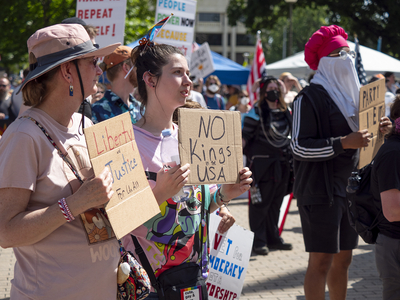 Kansans protest President Donald Trump at the June 14, 2025, "No Kings" rally at the Statehouse in Topeka.