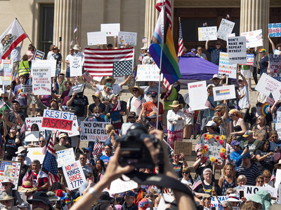 Kansans protest President Donald Trump at the June 14, 2025, "No Kings" rally at the Statehouse in Topeka.