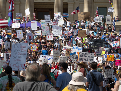 Kansans protest President Donald Trump at the June 14, 2025, "No Kings" rally at the Statehouse in Topeka.