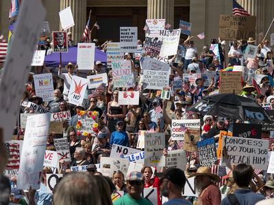 Kansans protest President Donald Trump at the June 14, 2025, "No Kings" rally at the Statehouse in Topeka.