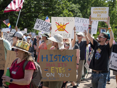 Kansans protest President Donald Trump at the June 14, 2025, "No Kings" rally at the Statehouse in Topeka.