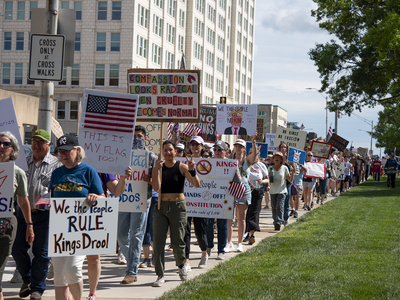 Kansans protest President Donald Trump at the June 14, 2025, "No Kings" rally at the Statehouse in Topeka.
