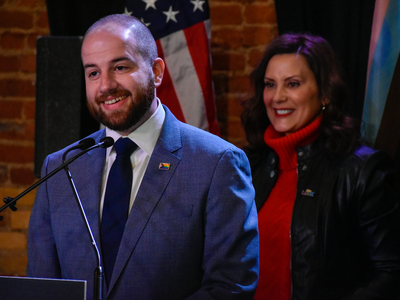 Whitmer signs LGBTQ+ non-discrimination bill into law alongside civil rights pioneer Mel Larsen