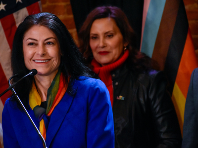 Whitmer signs LGBTQ+ non-discrimination bill into law alongside civil rights pioneer Mel Larsen