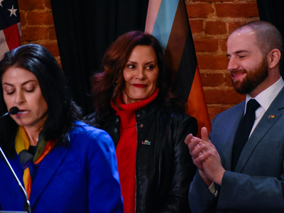 Whitmer signs LGBTQ+ non-discrimination bill into law alongside civil rights pioneer Mel Larsen