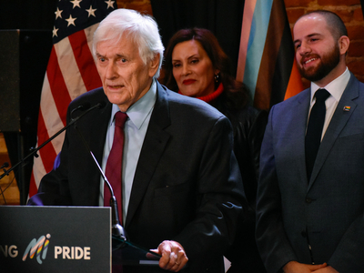Whitmer signs LGBTQ+ non-discrimination bill into law alongside civil rights pioneer Mel Larsen