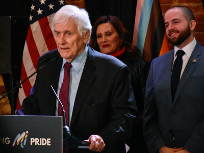 Whitmer signs LGBTQ+ non-discrimination bill into law alongside civil rights pioneer Mel Larsen