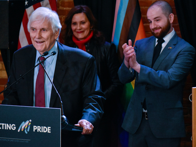 Whitmer signs LGBTQ+ non-discrimination bill into law alongside civil rights pioneer Mel Larsen