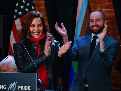 Whitmer signs LGBTQ+ non-discrimination bill into law alongside civil rights pioneer Mel Larsen