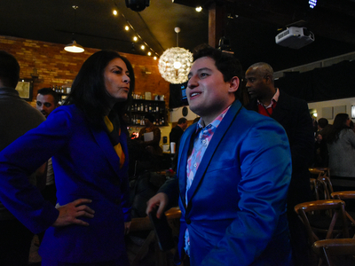 Whitmer signs LGBTQ+ non-discrimination bill into law alongside civil rights pioneer Mel Larsen