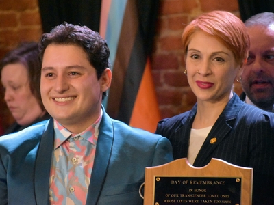 Whitmer signs LGBTQ+ non-discrimination bill into law alongside civil rights pioneer Mel Larsen