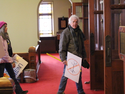 The People’s March draws hundreds to the Michigan Capitol before Trump’s inauguration