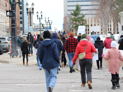 The People’s March draws hundreds to the Michigan Capitol before Trump’s inauguration
