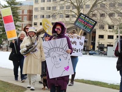 The People’s March draws hundreds to the Michigan Capitol before Trump’s inauguration