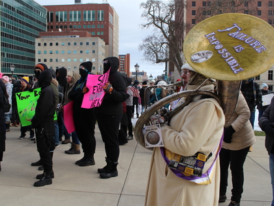 The People’s March draws hundreds to the Michigan Capitol before Trump’s inauguration
