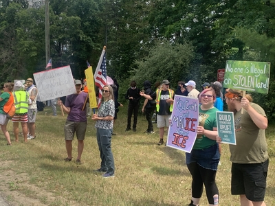 Demonstrators gather on Independence Day to protest ICE detention center in Baldwin