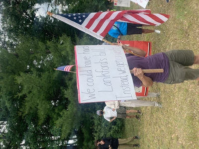 Demonstrators gather on Independence Day to protest ICE detention center in Baldwin