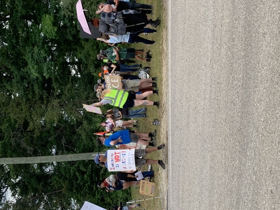 Demonstrators gather on Independence Day to protest ICE detention center in Baldwin