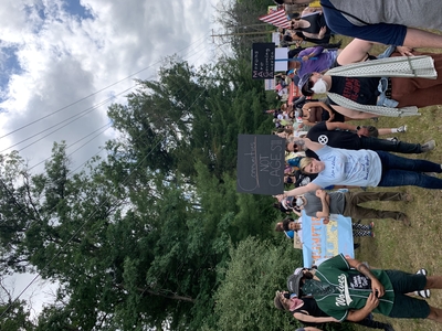 Demonstrators gather on Independence Day to protest ICE detention center in Baldwin