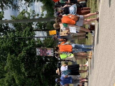 Demonstrators gather on Independence Day to protest ICE detention center in Baldwin