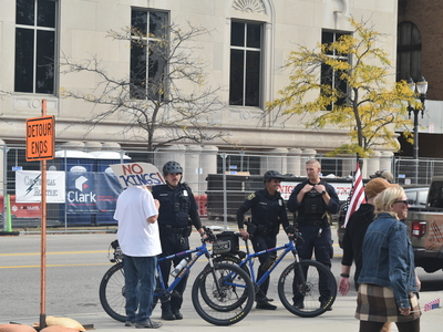 State police stand alongside the street on the outskirts of the protest.