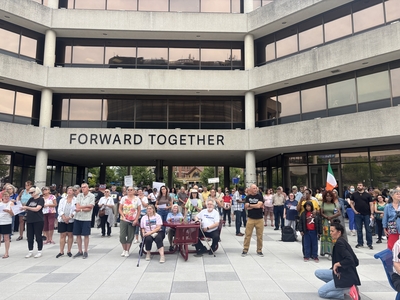 Hundreds of people in Springfield, Ohio rallied to show their support for Haitians after the U.S. Supreme Court ruled that President Donald Trump can end legal status for Haitians who’ve fled the violence in their home country on June 25, 2026. (Photo by Megan Henry, Ohio Capital Journal).