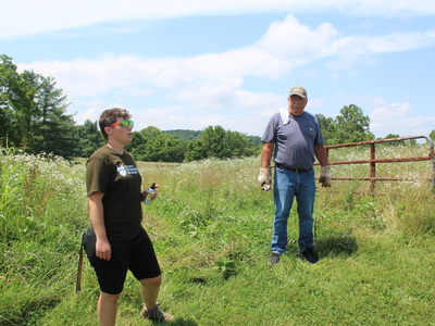 Buckeye Environmental Network organizer Bev Reed (left) and Bob Wilson, an oil producer in Washington County (right), in Marietta on July 7, 2026. (Photo by Megan Henry, Ohio Capital Journal).