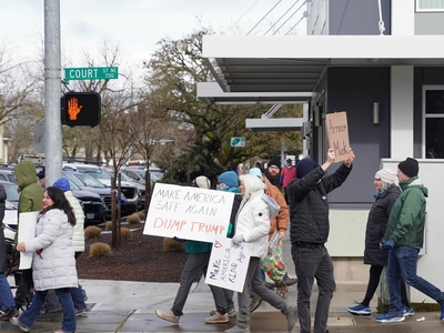 Hundreds rally in Salem, Portland against Trump, Musk moves on funding, against agencies