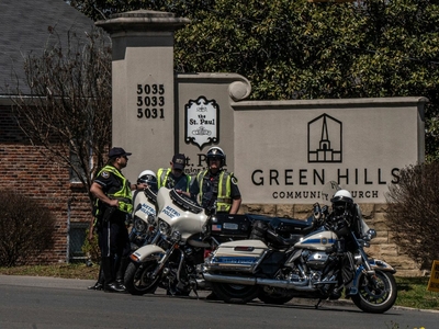 Metro Nashville Police officers on watch in Nashville's Green Hills neighborhood, near the site of Monday's Covenant School shooting. (Photo: John Partipilo)