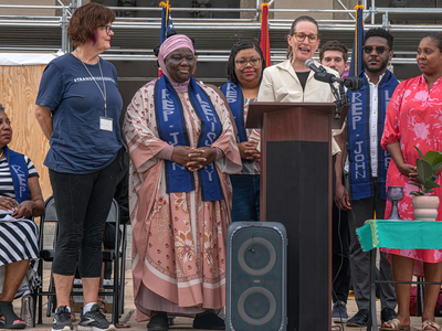 Nashville Vice-Mayor Angie Henderson makes remarks at the "Lighting Our World" vigil on Wednesday, July 17, 2023. With her are, from left, Metro Nashville councilmembers Ginny Welsch, Zulfat Suara, Delicia Porterfield, Jacob Kupin, Jeff Preptit and Joy Styles. (Photo: John Partipilo)