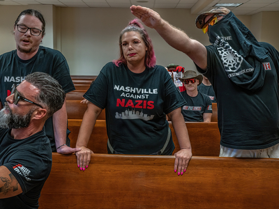 Reyn Hour and Nicki Pope, left and second from left, members of a group called Nashville against Nazis, engage with members of the Goyim Defense League. (Photo: John Partipilo)