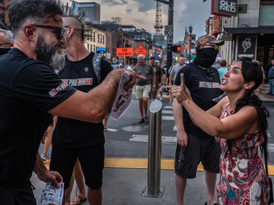 Melissa Alveraz, 39, argues with members of the Goyim Defense league who yelled anti-semitic epithets at her on Nashville's Lower Broadway. (Photo: John Partipilo)
