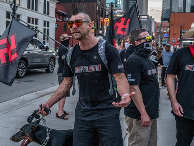 A member of the Goyim Defense League yells at passerby. (Photo: John Partipilo)
