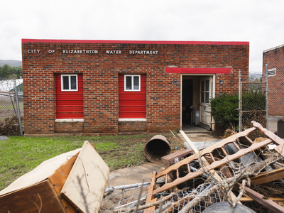 Flood debris piled outside the Elizabethton, Tennessee, water department. (Photo: Brandon Hull/Office of the Governor)