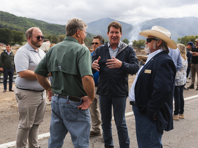 U.S. Sen. Bill Hagerty, facing camera, talks with officials in East Tennessee on Tuesday. (Photo: Brandon Hull/Office of the Governor)