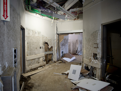 The interior of Unicoi County Hospital, which was destroyed by a flood during Hurricane Helene, opened in 2018 on a piece of property in a known flood plain between the Nolichucky River and Interstate 26 in Erwin, Tennessee. Previously, the hospital was located in downtown Erwin. It is unclear when or where a new hospital will be built, but the CEO of Ballad Health, which owns the hospital, said he would avoid building it in a flood plain. (Maddy Alewine for KFF Health News)