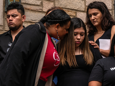 Jennifer Vasquez Sura, in black dress, wife of Kilmar Abrego Garcia, is embraced by friends and supporters before speaking at First Lutheran Church in Nashville before Abrego Garcia's June 13 arraignment on federal trafficking charges. (Photo: John Partipilo/Tennessee Lookout)