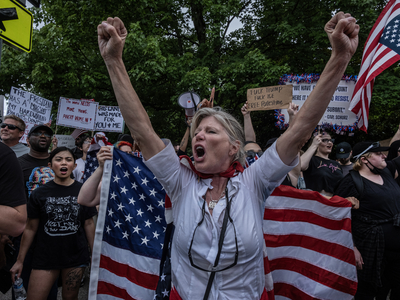 Jenny Thinnes shouts during a "No Kings" protest in Nashville as part of a nationwide pushback on President Donald Trump's policies. (Photo: John Partipilo/Tennessee Lookout)