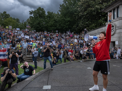Jermaine Cole, 18, fires up the crowd in Nashville's Bicentennial Mall Park. (Photo: John Partipilo/Tennessee Lookout)