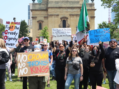 Protesters gather in Milwaukee's Cathedral Square to march and rally as part of the No Kings Day protests nationwide. (Photo by Isiah Holmes/Wisconsin Examiner)