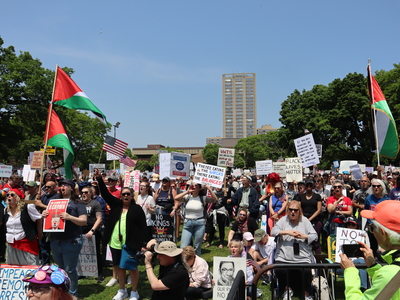 Protesters gather in Milwaukee's Cathedral Square to march and rally as part of the No Kings Day protests nationwide. (Photo by Isiah Holmes/Wisconsin Examiner)