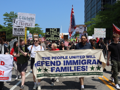 Protesters gather in Milwaukee's Cathedral Square to march and rally as part of the No Kings Day protests nationwide. (Photo by Isiah Holmes/Wisconsin Examiner)