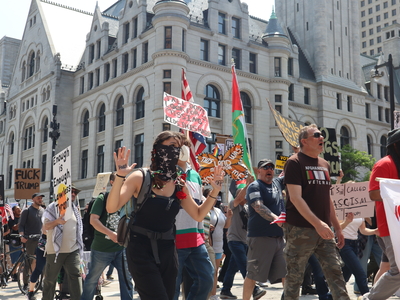 Protesters gather in Milwaukee's Cathedral Square to march and rally as part of the No Kings Day protests nationwide. (Photo by Isiah Holmes/Wisconsin Examiner)