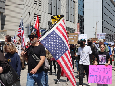 Protesters gather in Milwaukee's Cathedral Square to march and rally as part of the No Kings Day protests nationwide. (Photo by Isiah Holmes/Wisconsin Examiner)