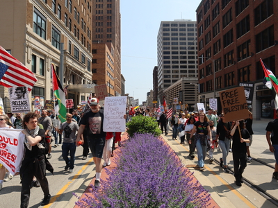 Protesters gather in Milwaukee's Cathedral Square to march and rally as part of the No Kings Day protests nationwide. (Photo by Isiah Holmes/Wisconsin Examiner)