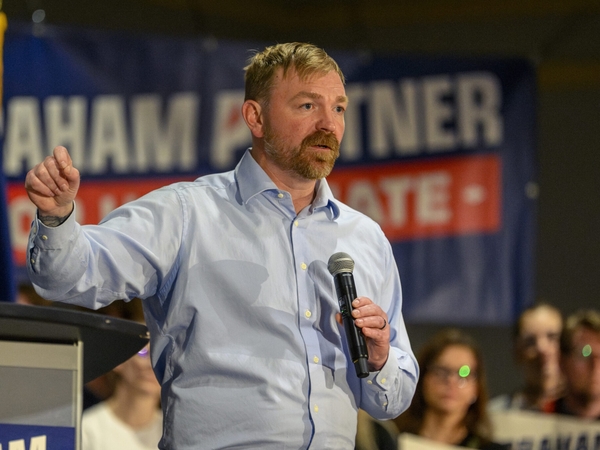 Maine's Graham Platner is the Democratic candidate for what's considered one of the nation's most competitive battle for the U.S. Senate. Platner, who is challenging incumbent Sen. Susan Collins, is shown at a rally at the Holiday Inn by the Bay in Portland on April 18, 2026. (Photo by Jim Neuger/ Maine Morning Star)