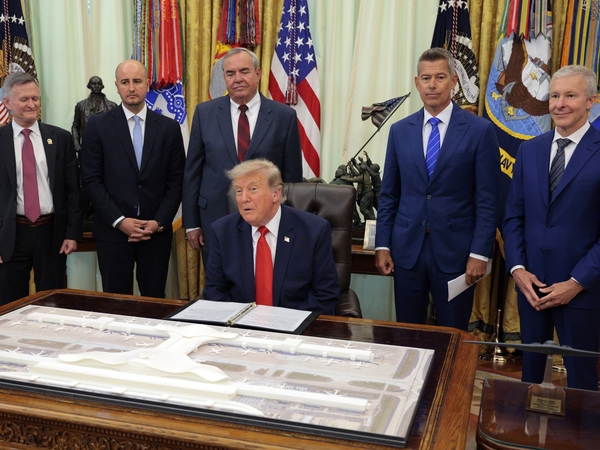 resident Donald Trump is joined by (L-R) Deputy Secretary of Transportation Steven G. Bradbury, MWAA board member Trent Morse, MWAA CEO Jack Potter, U.S. Secretary of Transportation Sean Duffy, and United Airlines CEO Scott Kirby during an announcement to renovate Washington Dulles International Airport, in the Oval Office of the White House on July 29, 2026 in Washington, DC. The Department of Transportation plans to unveil a $22 billion plan to rebuild the federally owned airport that will include an unde